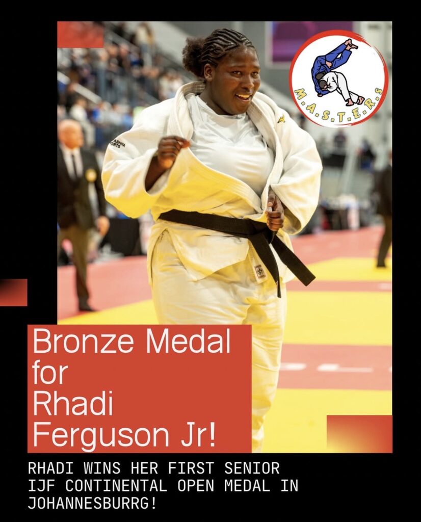 Image depicting Rhadi Ferguson Jr celebrating a bronze medal win at her first senior IJF continental open